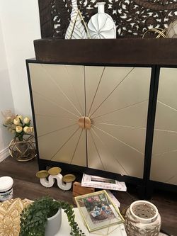 Two Gold and black accent cabinets