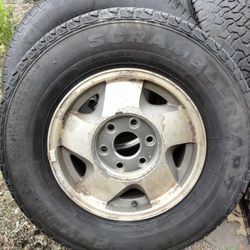 1 Obs  Chevy/ Gmc 6 Lug Rim And Tire.