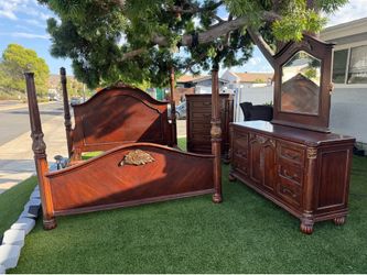 King-size bedroom set including mattress, 6-drawer dresser with mirror, and 5-drawer chest.