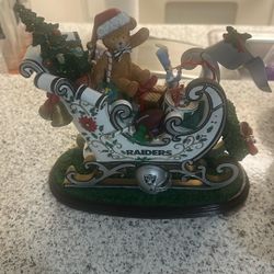 Oakland Raiders Danbury mint 2001 christmas Sleigh VHTF...Excellent condition and Pillow Pet