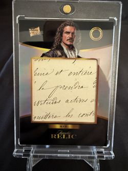 This is a trading card from the "Pieces of the Past" series that features an authentic relic, which is a piece of an original handwritten document, fr