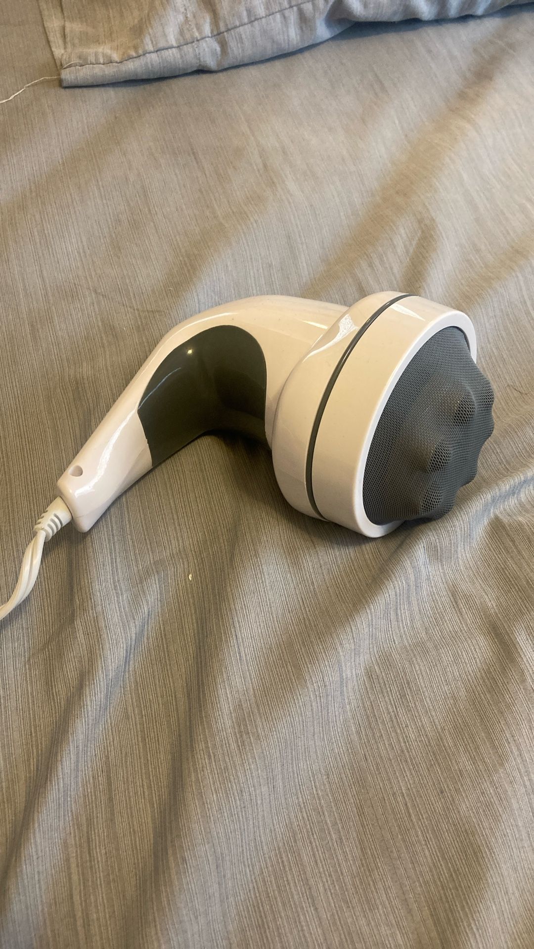 Handheld body massager