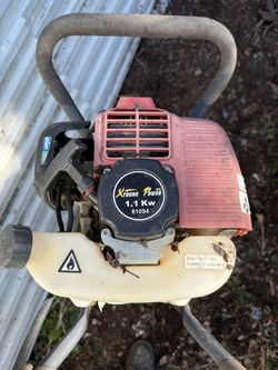 gas-powered earth auger,