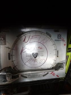 Husqvarna soff cut 14 inch blades retail $400 $100 each I have to 150 for both
