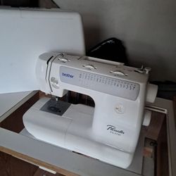 Sewing Machine With Cabinet Table  