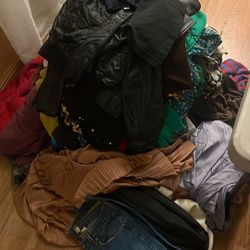 Clothes dresses Jeans Tops, Sweaters all in very great condition. 