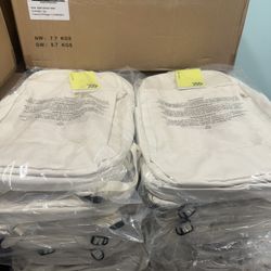 12 brand new backpacks — sealed case.