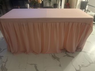 6ft pink table cover and a pink long curtain