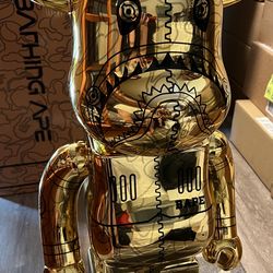Bearbrick x BAPE x Hajime Sorayama Gold Camo Shark 1000%