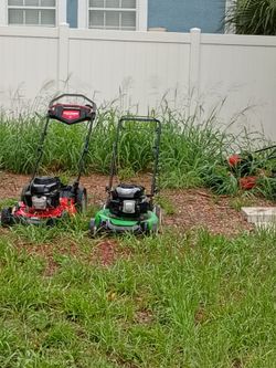 4 broken lawnmowers