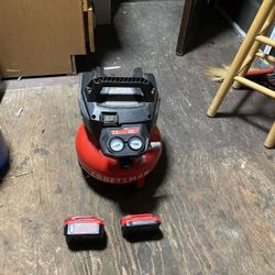 The air compressor uses a 2.5-gallon tank and comes with 2 batteries: one 4.0Ah battery and one 2.0Ah battery.