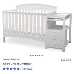 Delta crib with changing table plus matress