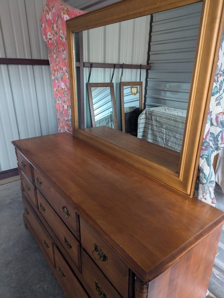 solid wood dresser with mirror, featuring a classic colonial style and brass hardware