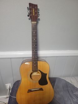 Guitarr First-Act MG406