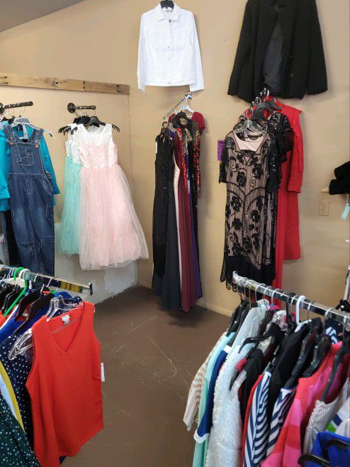 Women in girls new dresses $10 evening gowns $20 work pants $10 $10 jeans $20 sweaters $10