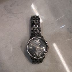 Emporio Armani AR1478 Ladies Ceramica Black Crystal Watch with a black ceramic case and bracelet. 