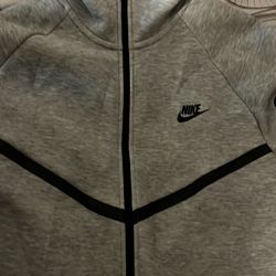 - Grey Nike Tech Fleece zip up hoodie size L