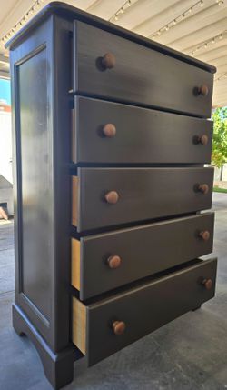 Chocolate brown dresser.