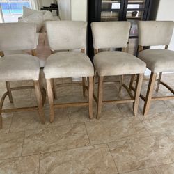 linen upholstered counter / bar stool with wooden legs