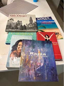 Assortment of coffee table book and biographies