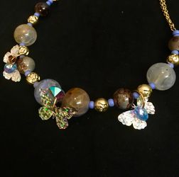 Periwinkle Butterfly necklace 18 inches long