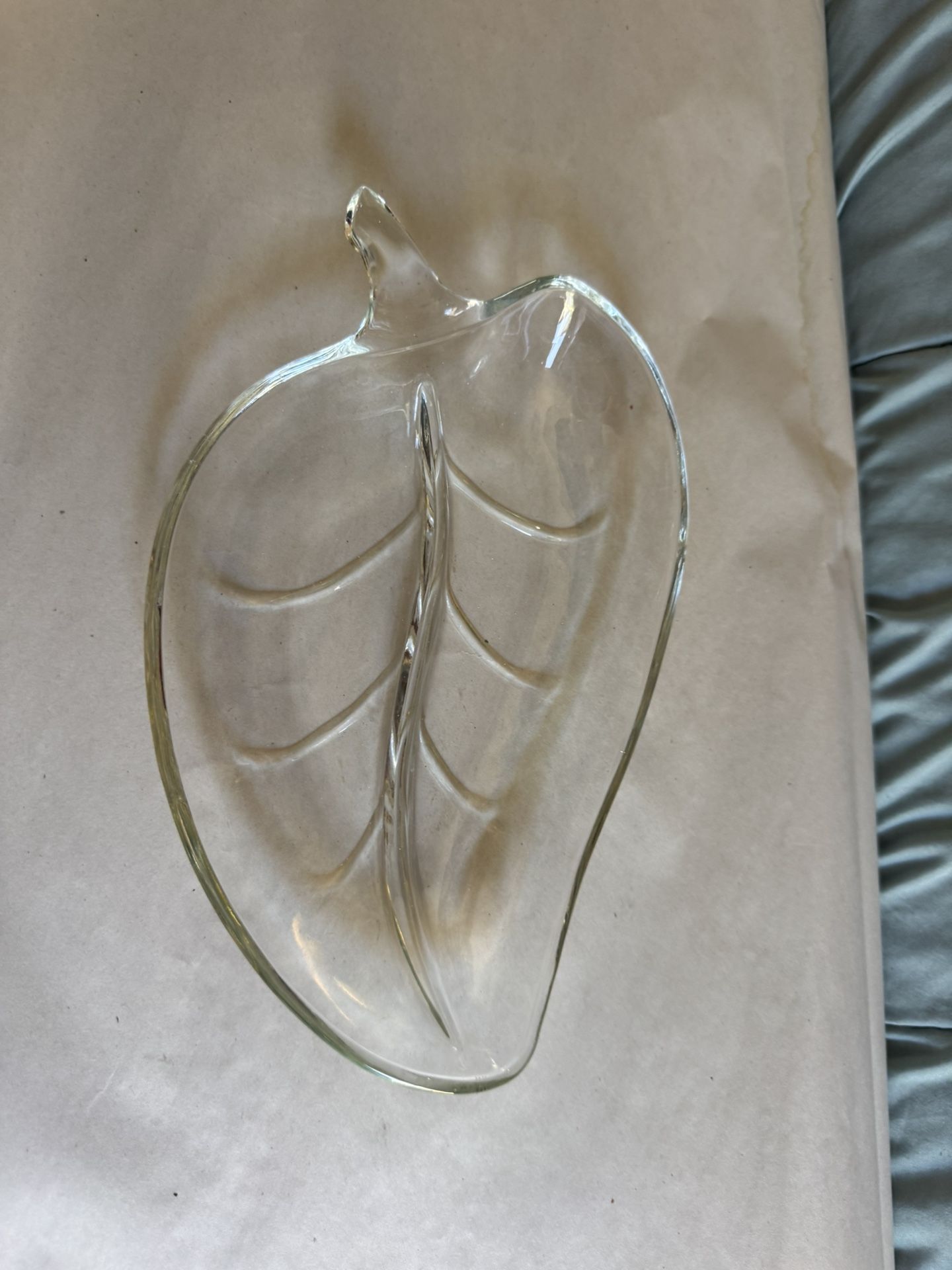 glass leaf-shaped dish is a vintage