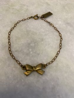Marc Jacobs Dainty Gold Bow Bracelet w/ Ring Clasp