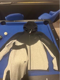 Black and grey Nike tech