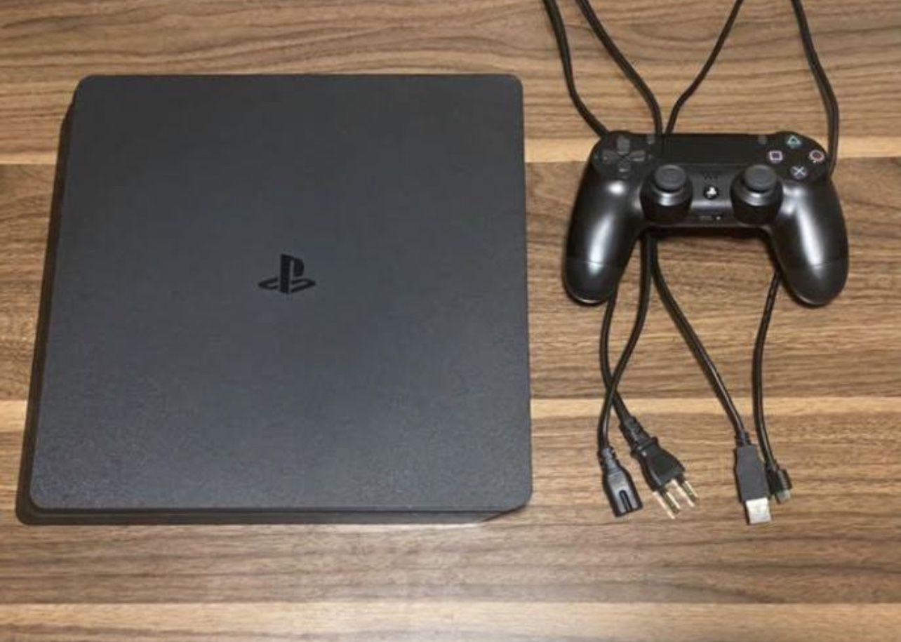 PS4 Consolole With A Controller