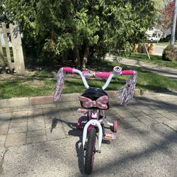 HUFFY DISNEY MINNIE MOUSE 12” KIDS BIKE IN EXCELLENT CONDITION WITH MATCHING HELMET
