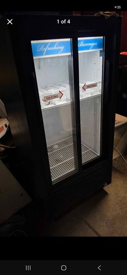 Small 4.5ft tall working display  fridge
