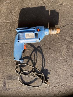 Power Craft corded impact drill with 1/2” chuck and reverse