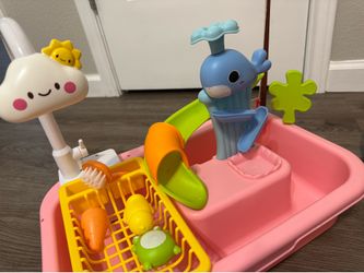 Running sink toy
