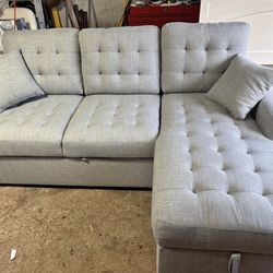 Raymour and Flanagan McCoy 2 pc sectional with sleeper