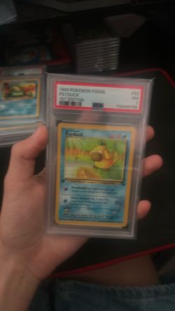 Cash Only — 1999 Pokémon Fossil 1st Edition Psyduck PSA 7