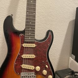 Electric Guitar With Amplifier