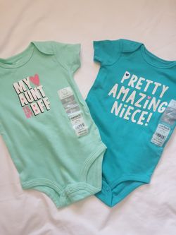 CARTER'S baby girl onesie's.