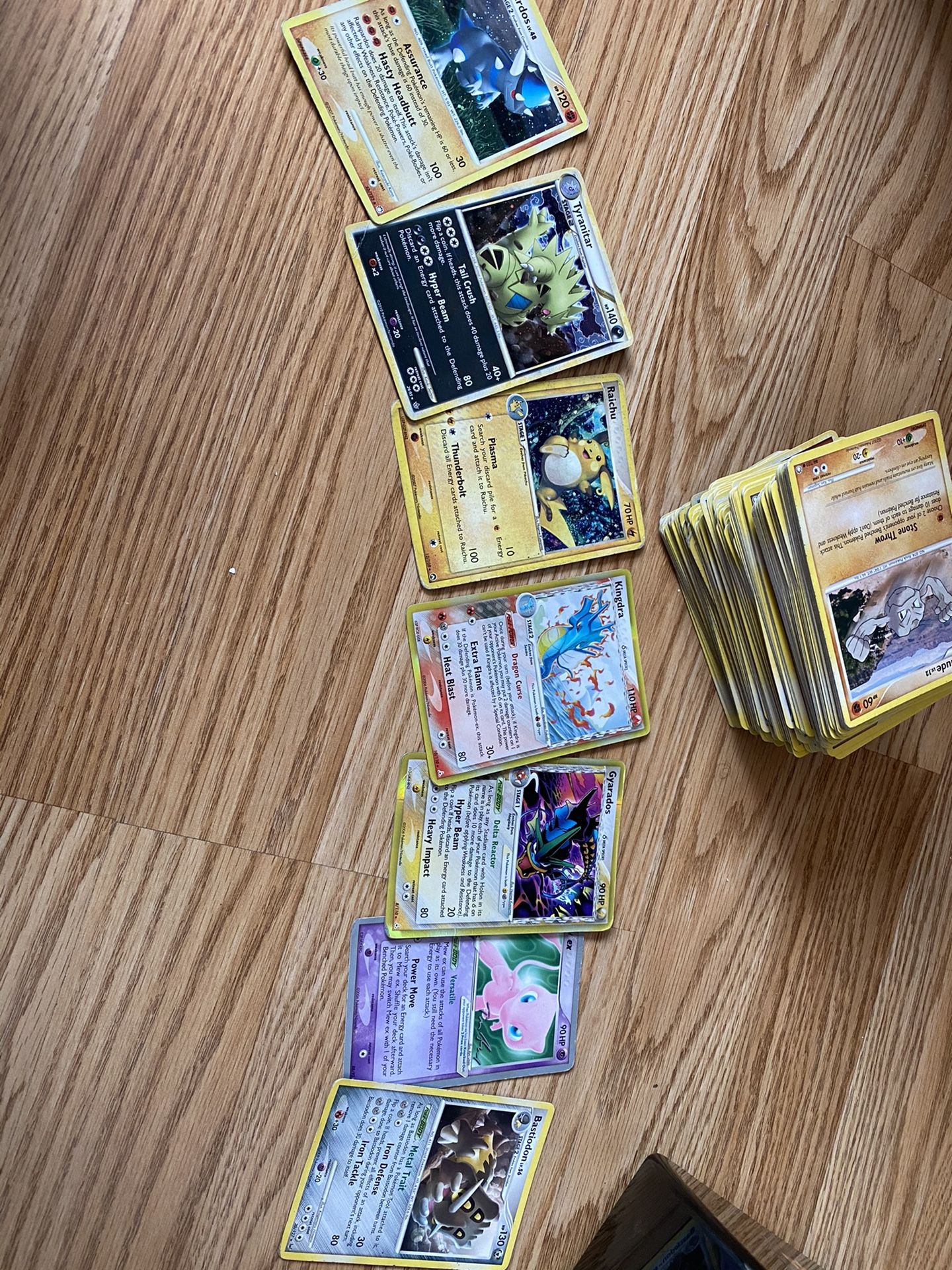 Stack of random Pokémon cards 100+