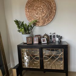 Solid wood media cabinet.