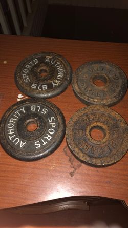 4 Iron Dumb Bell Plates  5lbs Each