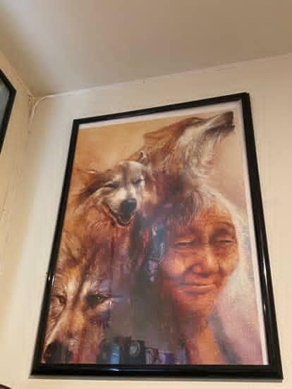 Large wolf picture in frame