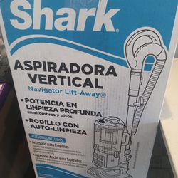 Brand new  Shark vacuum in the box Never open