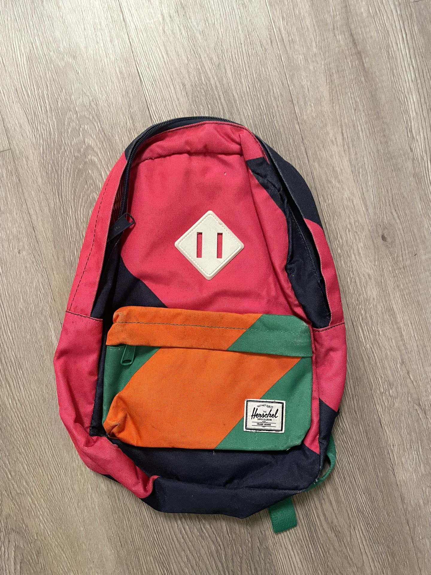 Multicolor -pink orange green blue Herschel Kids Heritage Backpack book bag Used, has stains and some wear. Please see pics for condition  13"x10"