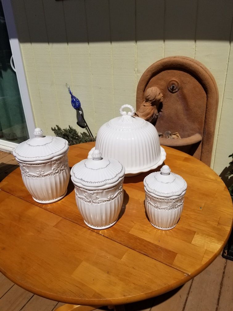Porcelain kitchen canisters with a cake stand
