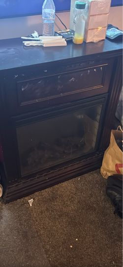 Brown Fireplace needs gone asap