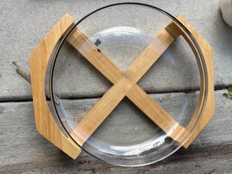 Large glass serving down in wood trivet holder