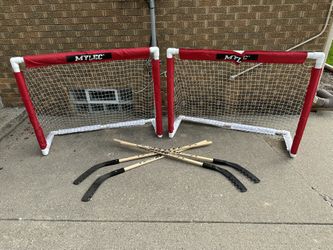 Mylec hockey equipment, 2 folding goals and 4 street hockey sticks