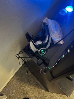 Ps5 slim - with 2 controllers and the charging port.