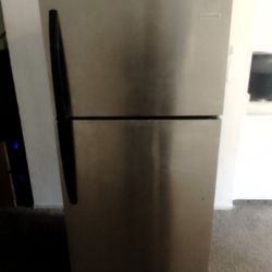 Frigidaire chrome and black refrigerator