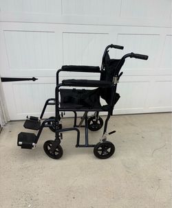 Transport wheelchair